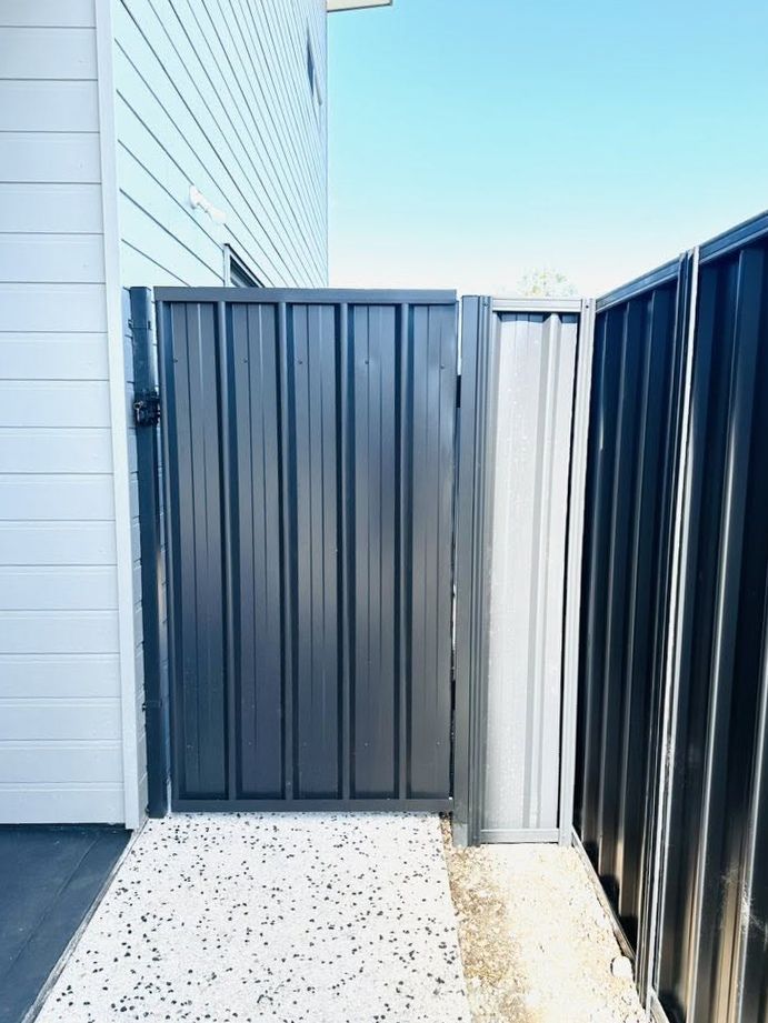 Single Colorbond side gate installed beside an Adelaide home